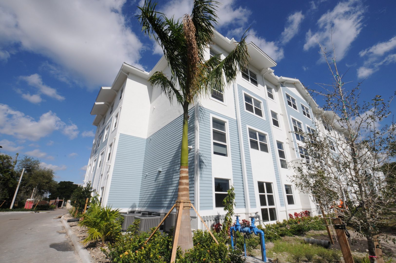 Four-story building under blue sky