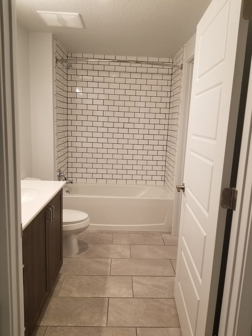 Modern bathroom with subway tile walls